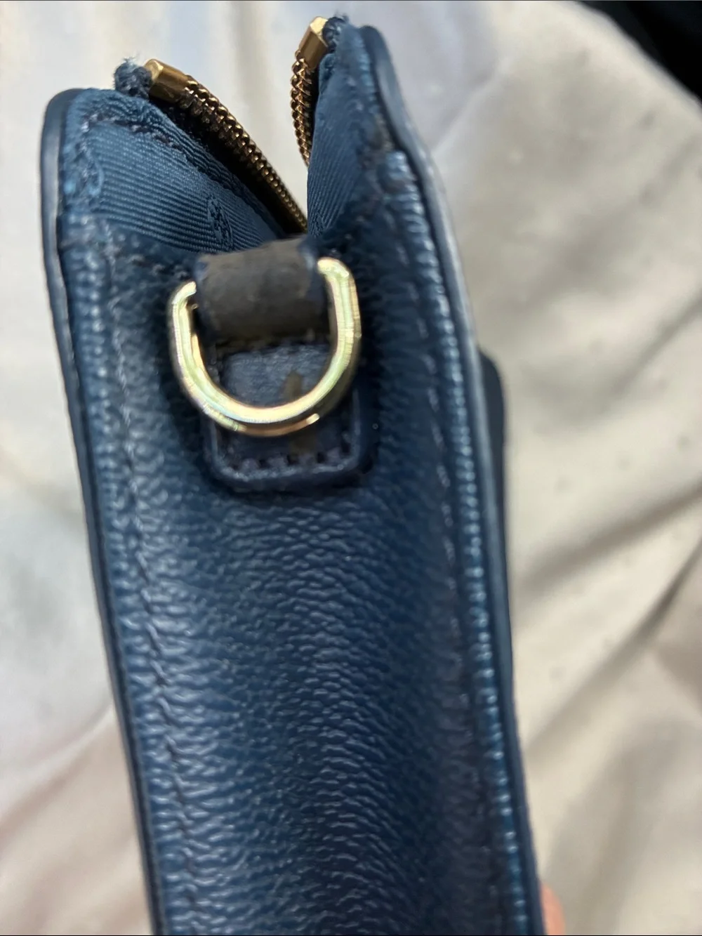 Fair condition Tory Burch Dark Navy Leather Zip pouch with Gold Logo